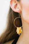 Shining gold-plated dangling earrings, exuding elegance and sophistication