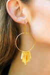 Shining gold-plated dangling earrings, exuding elegance and sophistication