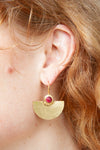 Ruby Crown Half-Moon Earring worn on ear, showing natural movement and scale of the piece
