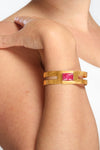 Gold plated bracelet with ruby gemstone. Modern design