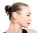 Side profile of Portal earrings revealing nested arch structure and musical elements